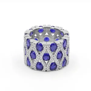Anillo grueso con zirconias redondas azul - plata 925